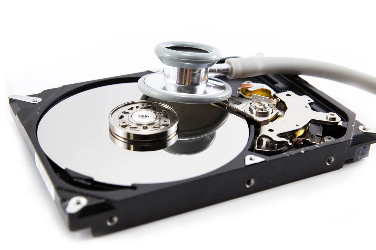 Hard Drive with Stethoscope - IT Services Graphic