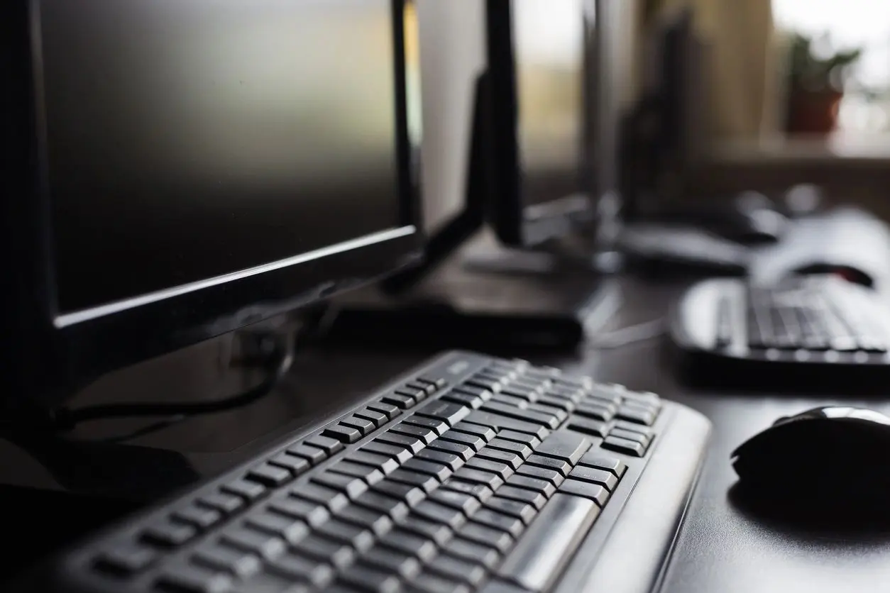 Closeup of Monitor, Mouse, and Keyboards in Office