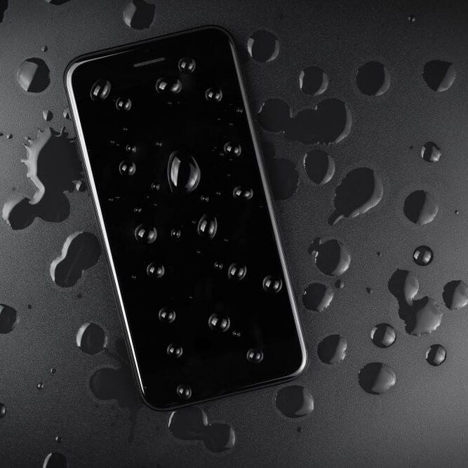 iPhoneDamageWaterCC An iPhone with water droplets on the screen.